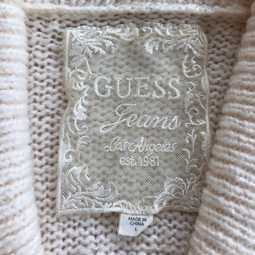 Off-white Guess knit sweater with loops for belt.